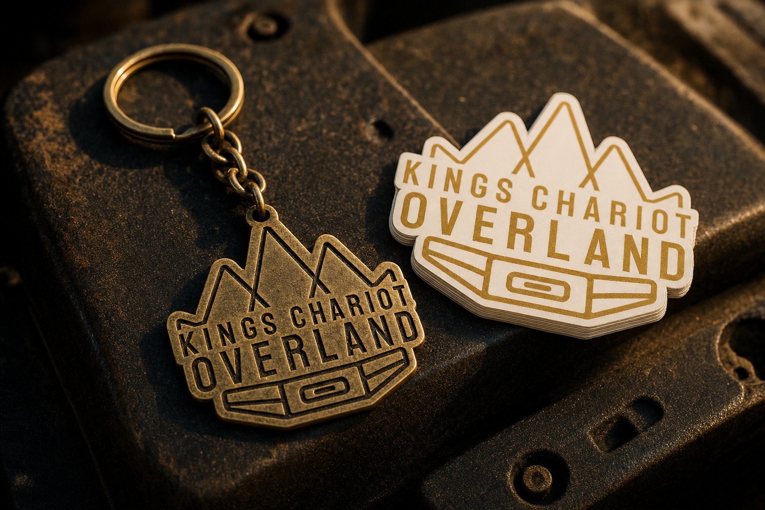 Brass crown-shaped acrylic King's Chariot Overland keychain on a sturdy split ring